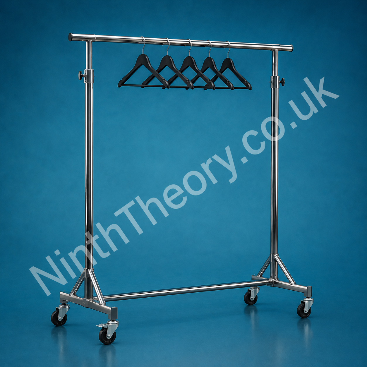 Chrome clothing rail with black hangers rental image